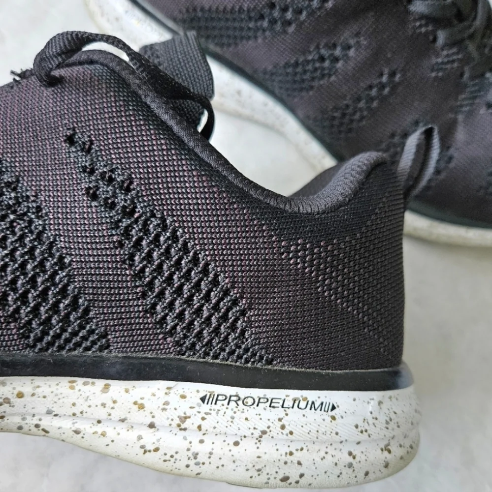 APL Techloom Pro black running shoes speckled soles